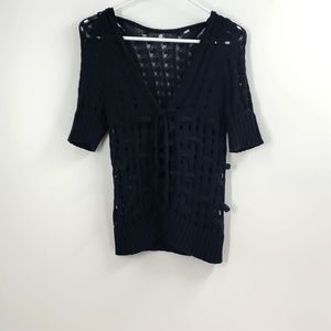 Knitted and knotted black short sleeve crochet style top